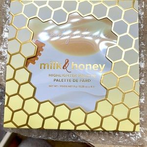 Milk and honey highlighter palette. Plastic sheet still intact.